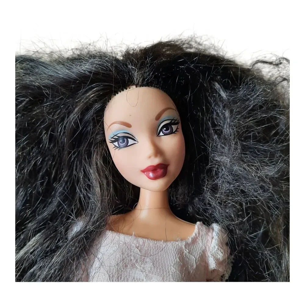 Monster High Doll with Black Hair and Pink Dress